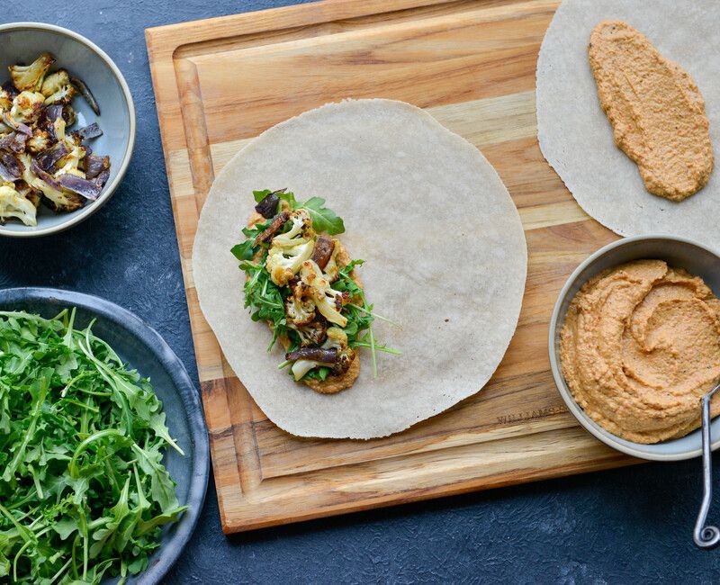 Roasted Cauliflower and Arugula Wraps with Red Pepper Chickpea Spread